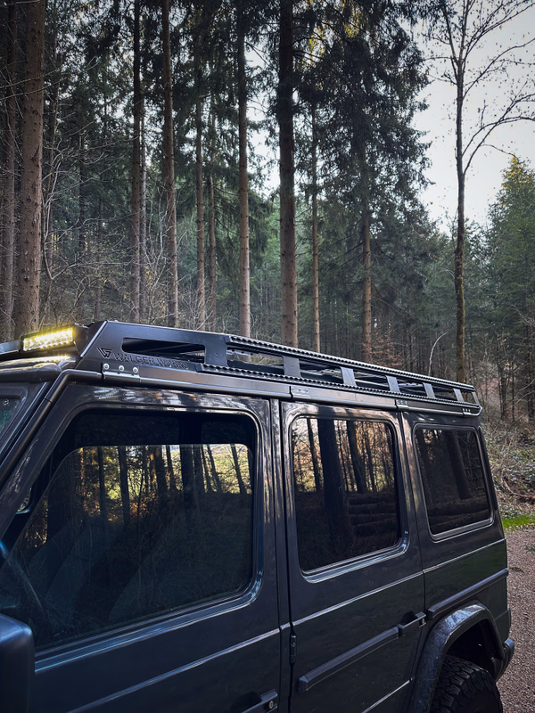 Walger Works roof rack with illuminated LED bar in forest