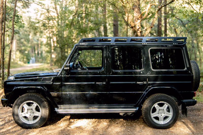 Black G-Class W463 with Walger Works roof rack, side profile
